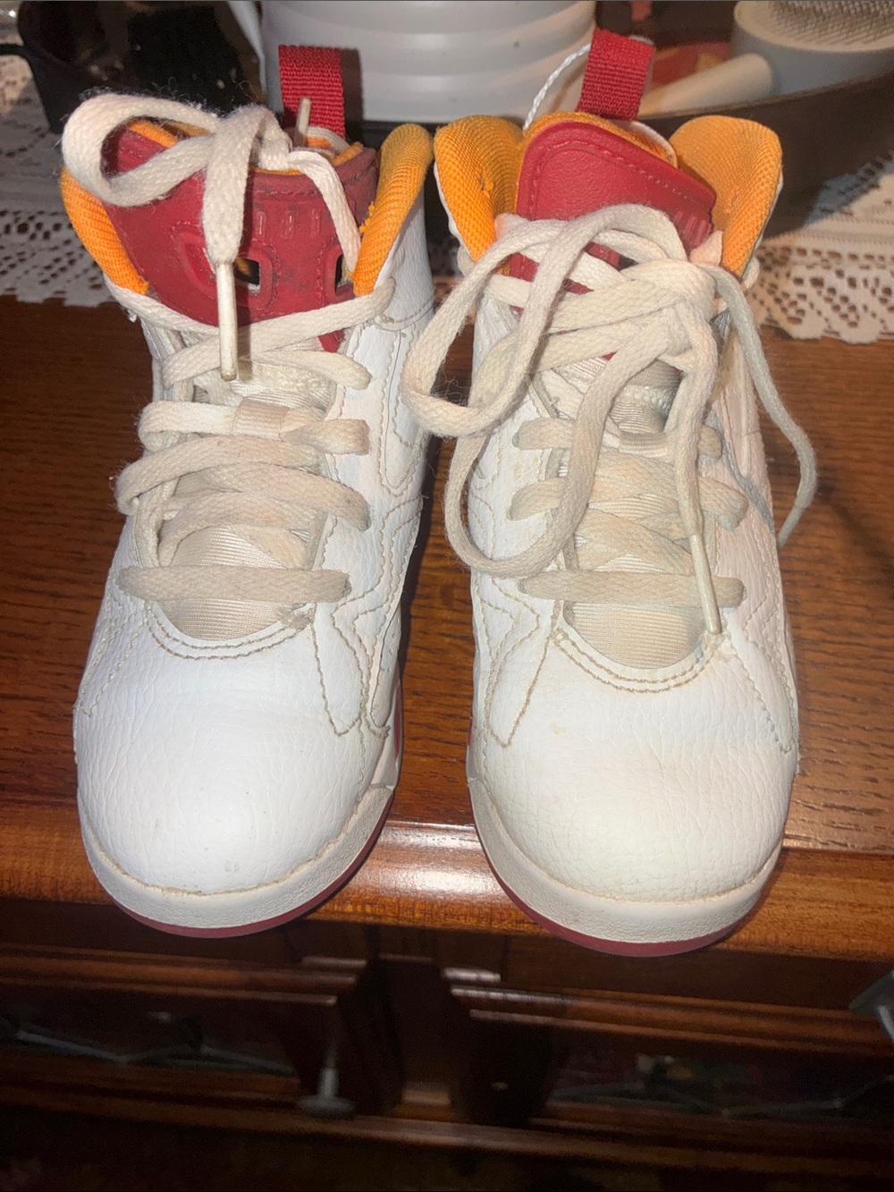 Nike Kids White Sneakers with Red and Orange Accents